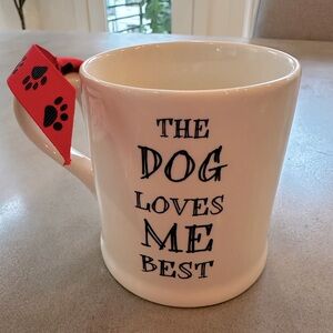 Gorgeous “ The Dog Loves Me More” Mug with Red Paw Print Ribbon. New never used.